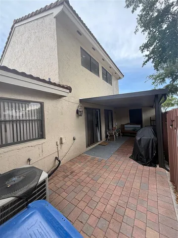 a bedroom with a bed and a chair