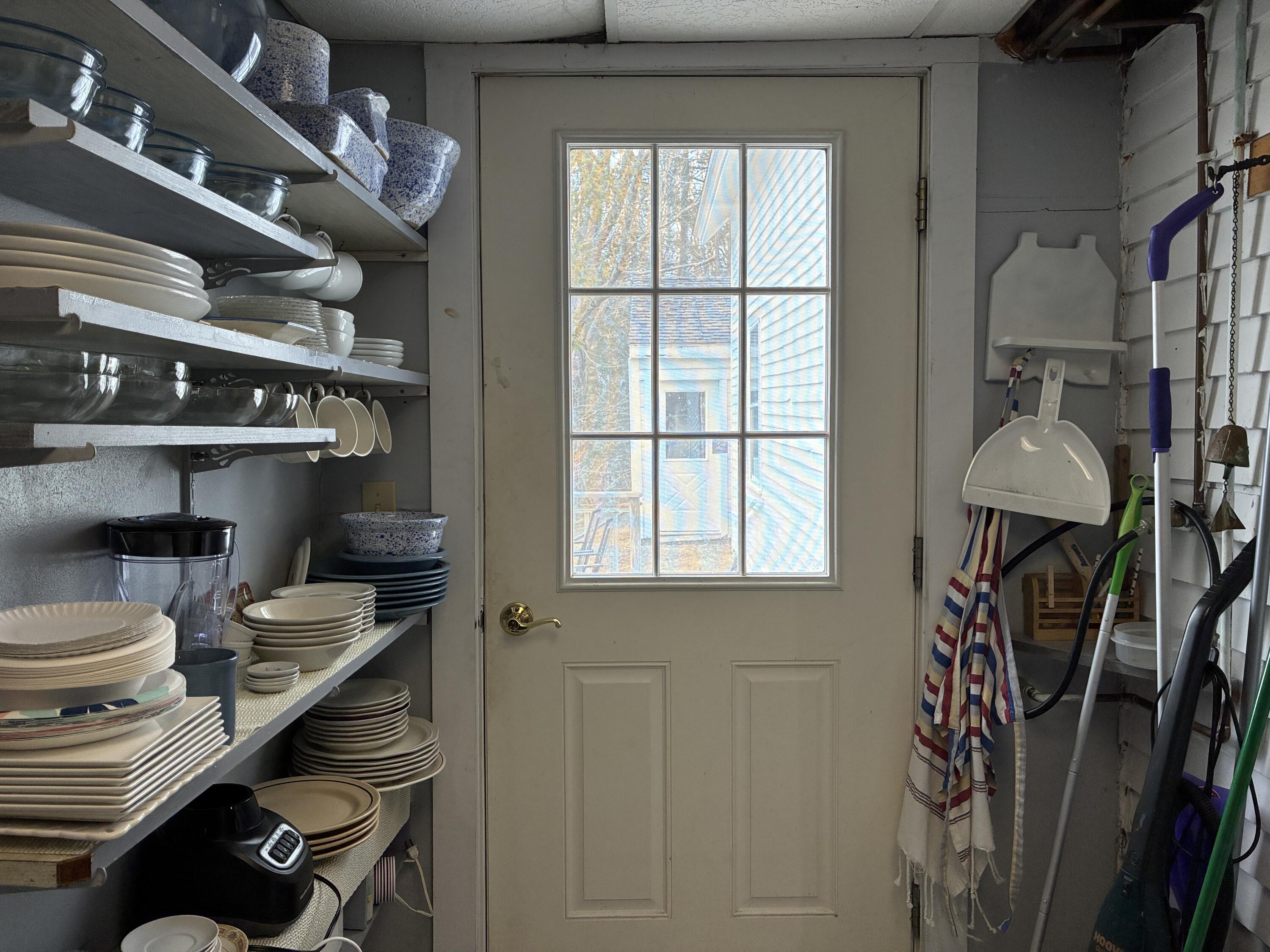 743 South Gouldsboro Road Gouldsboro, ME 04607 - Photo 13 of 38 Pantry with door to back deck.