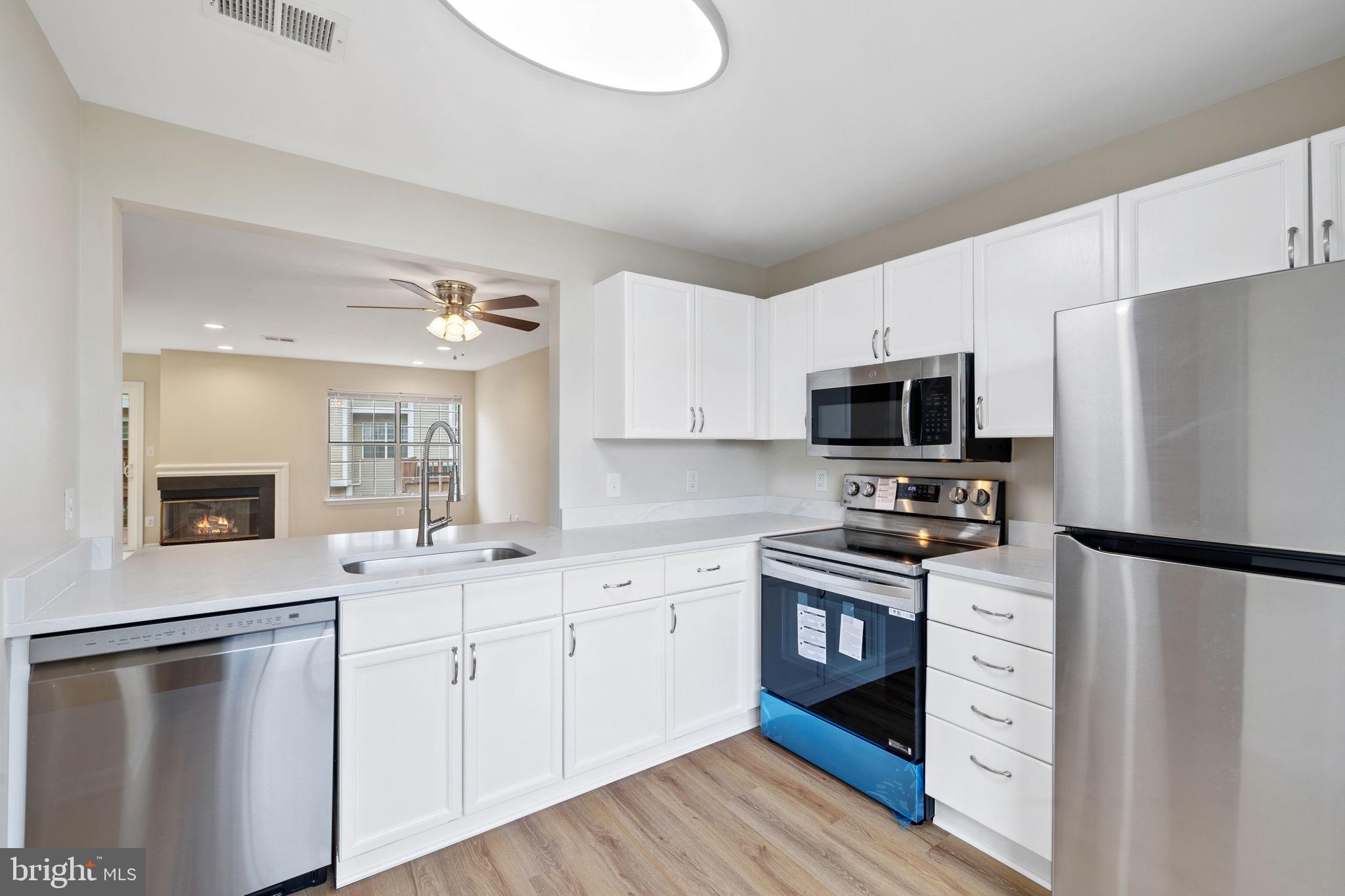 10909 Postern Court Manassas, VA 20109 - Photo 7 of 19 Open concept kitchen w/ quartz countertop