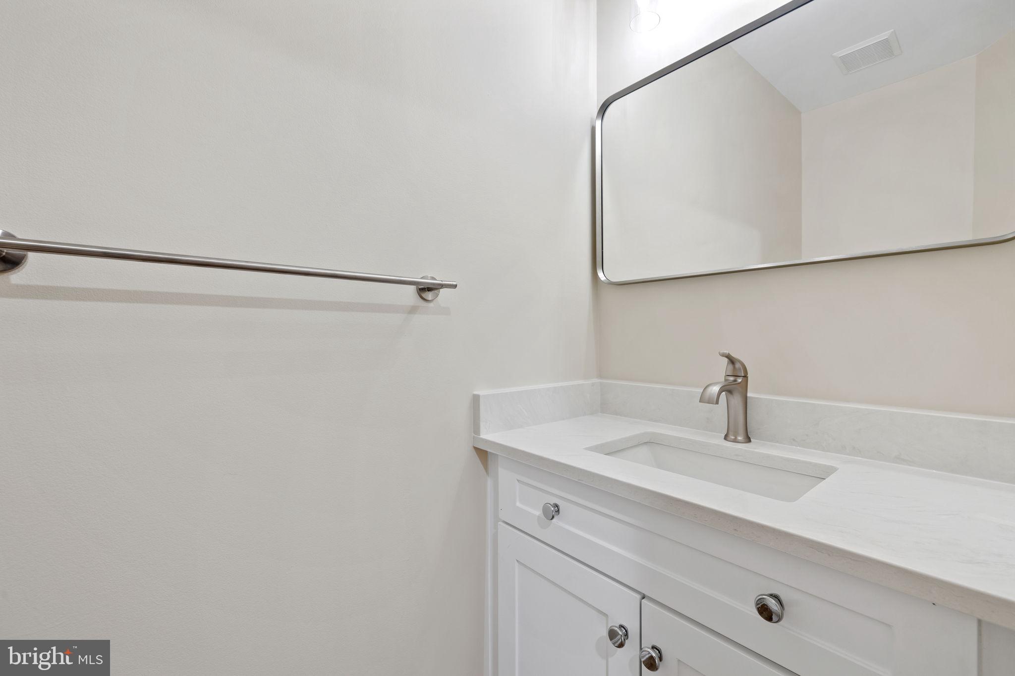 10909 Postern Court Manassas, VA 20109 - Photo 10 of 19 Updated half bath on the main level