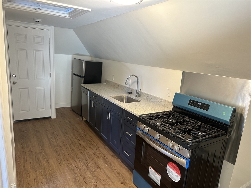 367 Concord Avenue, Unit 3 Cambridge, MA 02138 - Photo 2 of 7 a kitchen with a stove and a sink