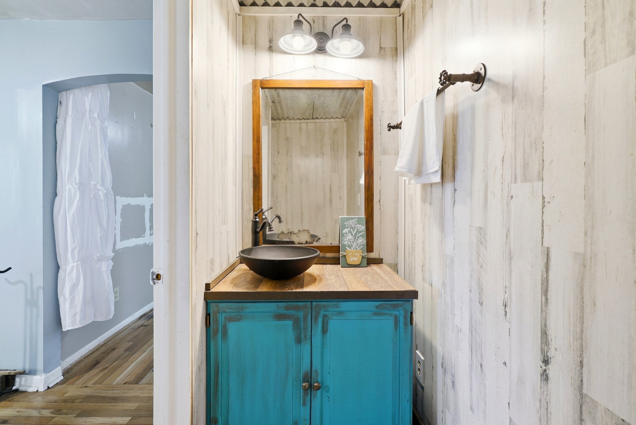 6471 Highway 161 Springfield, TN 37172 - Photo 28 of 57 a bathroom with a sink and a mirror