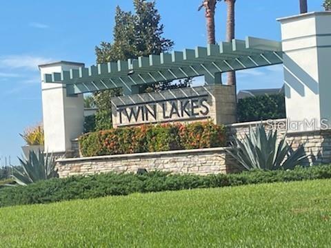 2513 Datura Loop St. Cloud, FL 34772 - Photo 2 of 3 a view of a street sign of a house and a yard