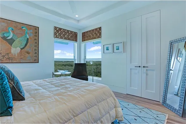 a bathroom with a sink toilet vanity and shower