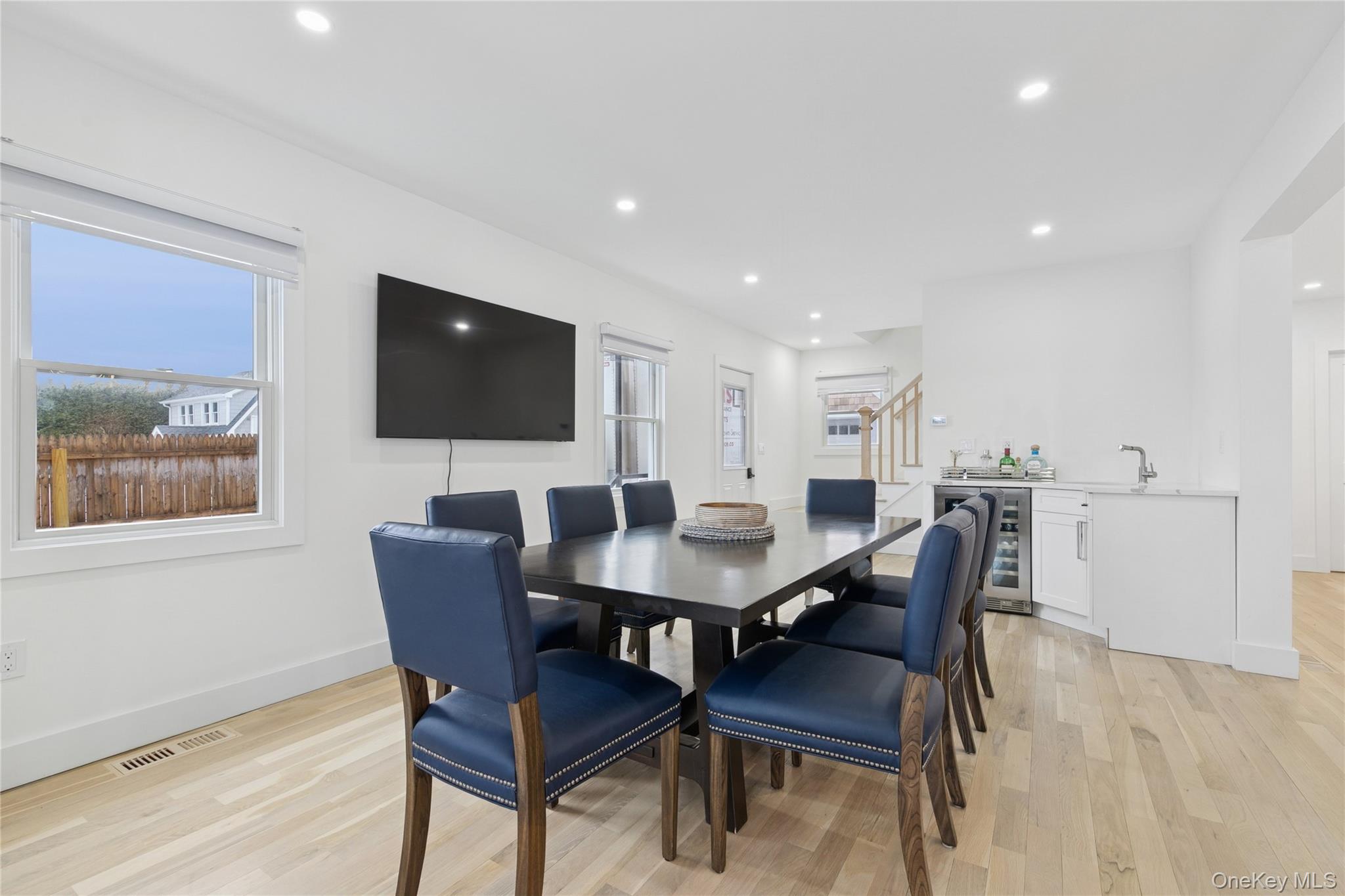 10 Sagamore Road Hampton Bays, NY 11946 - Photo 15 of 41 a view of a dining room with furniture