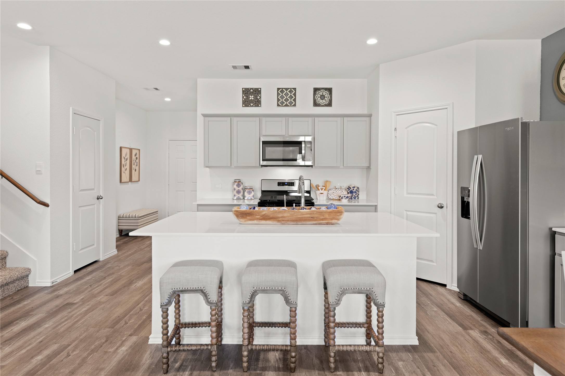 545 Wax Myrtle Way Hockley, TX 77447 - Photo 2 of 9 a kitchen with stainless steel appliances a refrigerator and a stove top oven