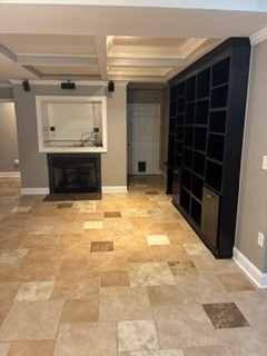 203 Indian Trail Road Seneca, SC 29672 - Photo 9 of 14 Built-in shelving anchor this versatile lower level living space.