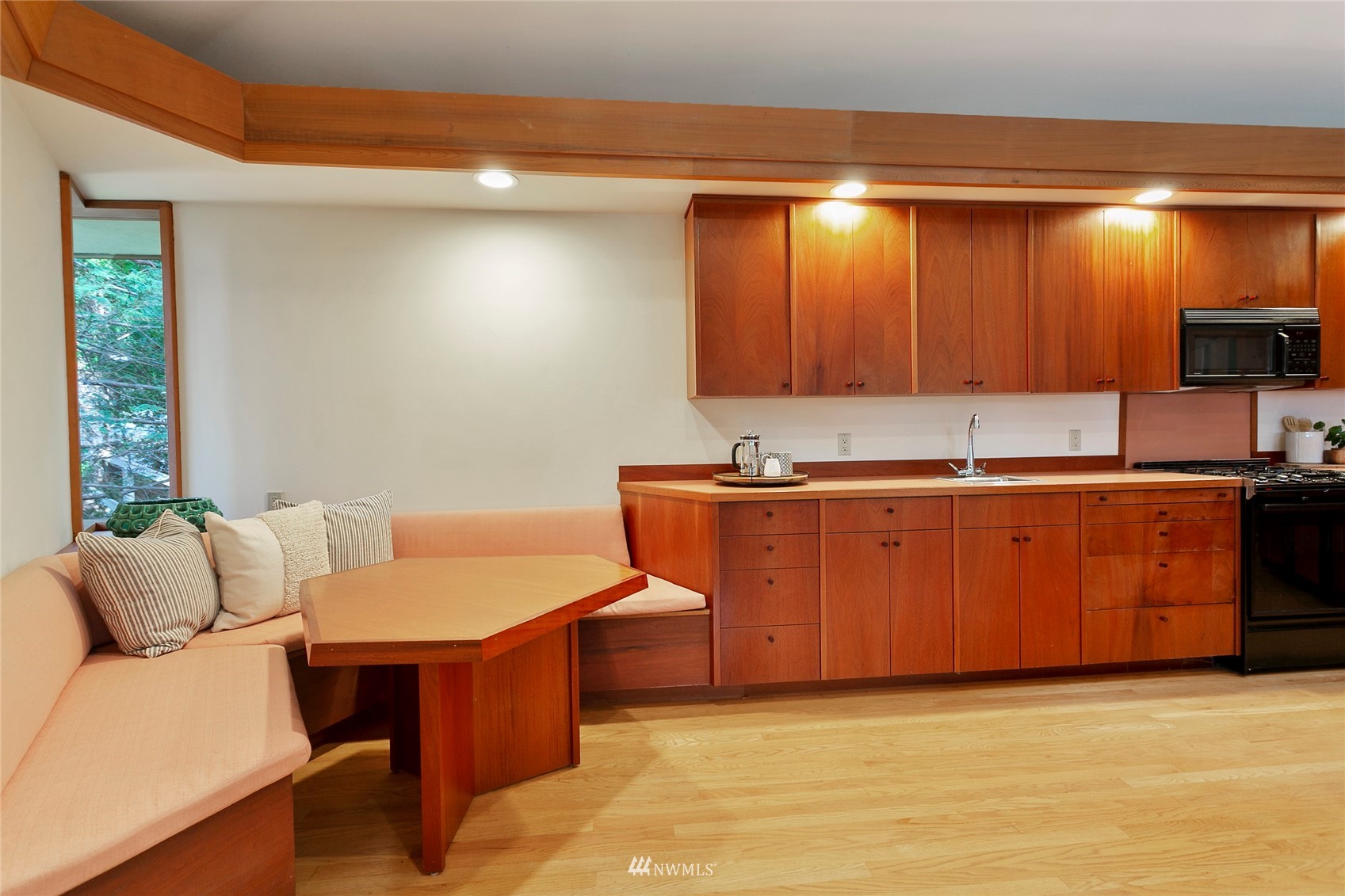 312 Sea Pines Road Bellingham, WA 98229 - Photo 17 of 39 a room with kitchen island furniture a sink and a stove