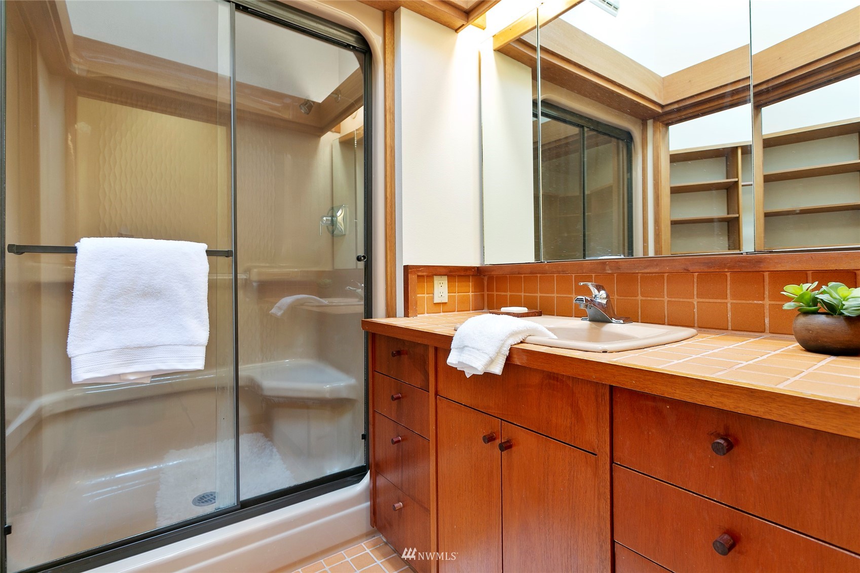 312 Sea Pines Road Bellingham, WA 98229 - Photo 24 of 39 a bathroom with a granite countertop sink and mirror