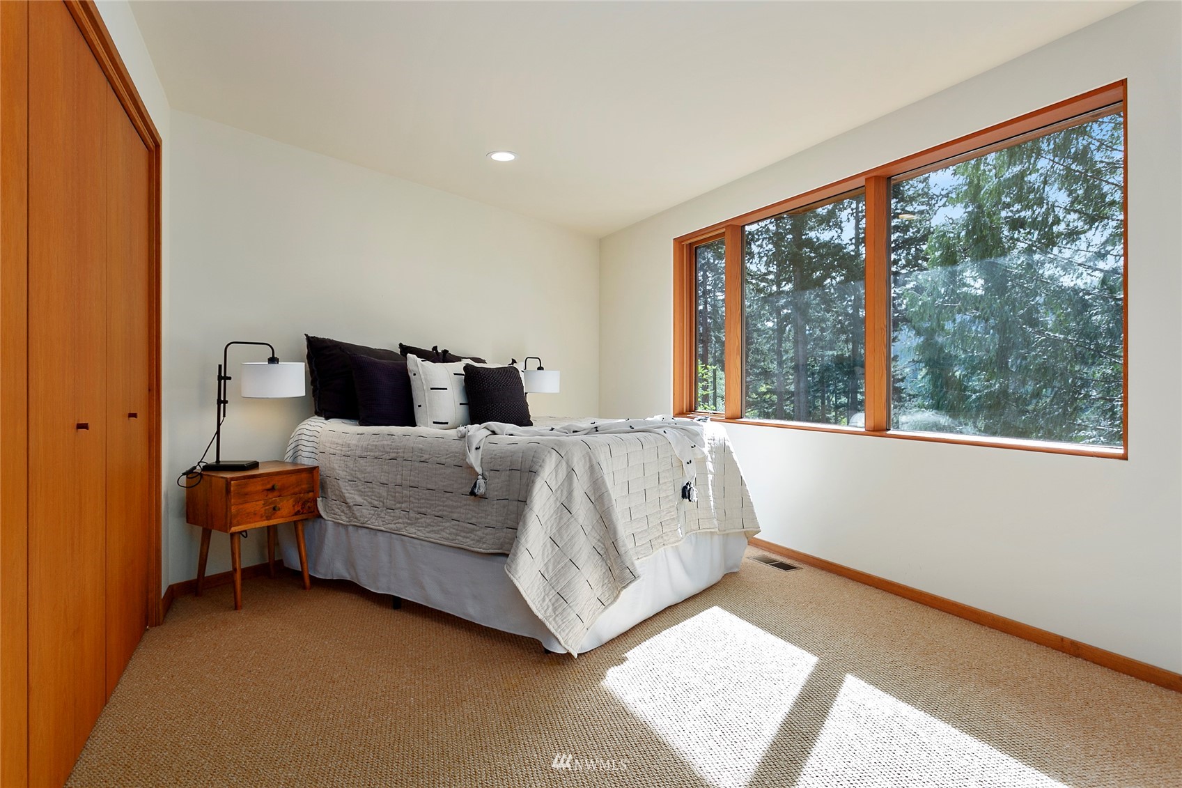 312 Sea Pines Road Bellingham, WA 98229 - Photo 26 of 39 a bed room with a bed and a large window