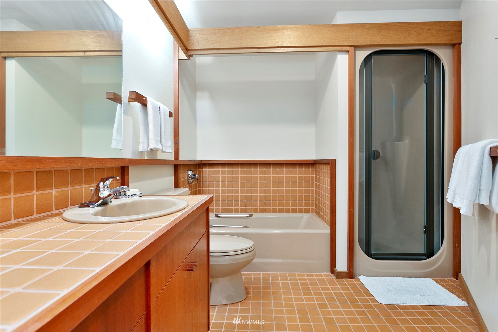 312 Sea Pines Road Bellingham, WA 98229 - Photo 27 of 39 a bathroom with a sink a toilet and shower