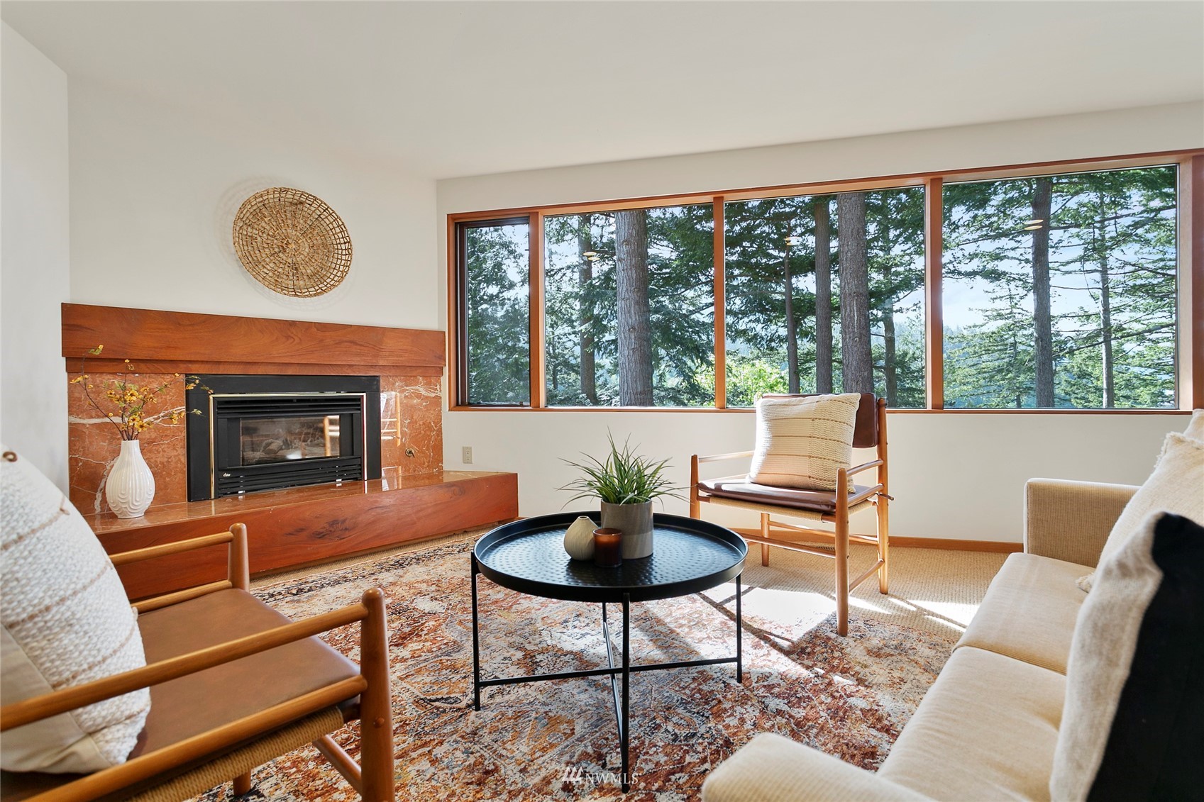 312 Sea Pines Road Bellingham, WA 98229 - Photo 28 of 39 a living room with furniture a fireplace and a large window