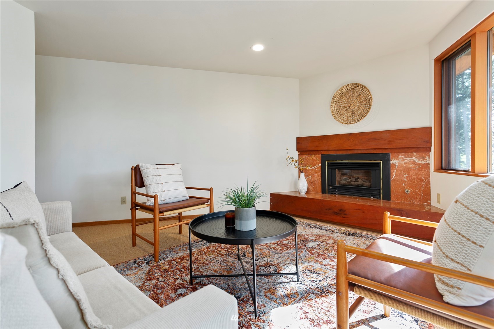 312 Sea Pines Road Bellingham, WA 98229 - Photo 29 of 39 a living room with furniture and a fireplace