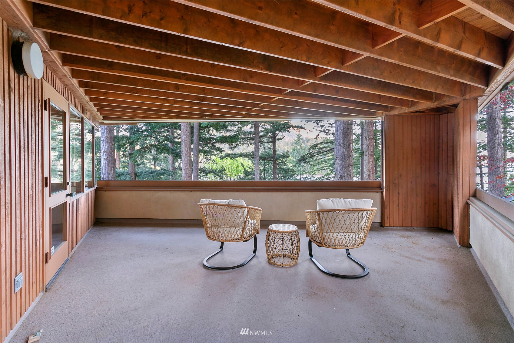312 Sea Pines Road Bellingham, WA 98229 - Photo 34 of 39 a view of a chairs and table in the balcony