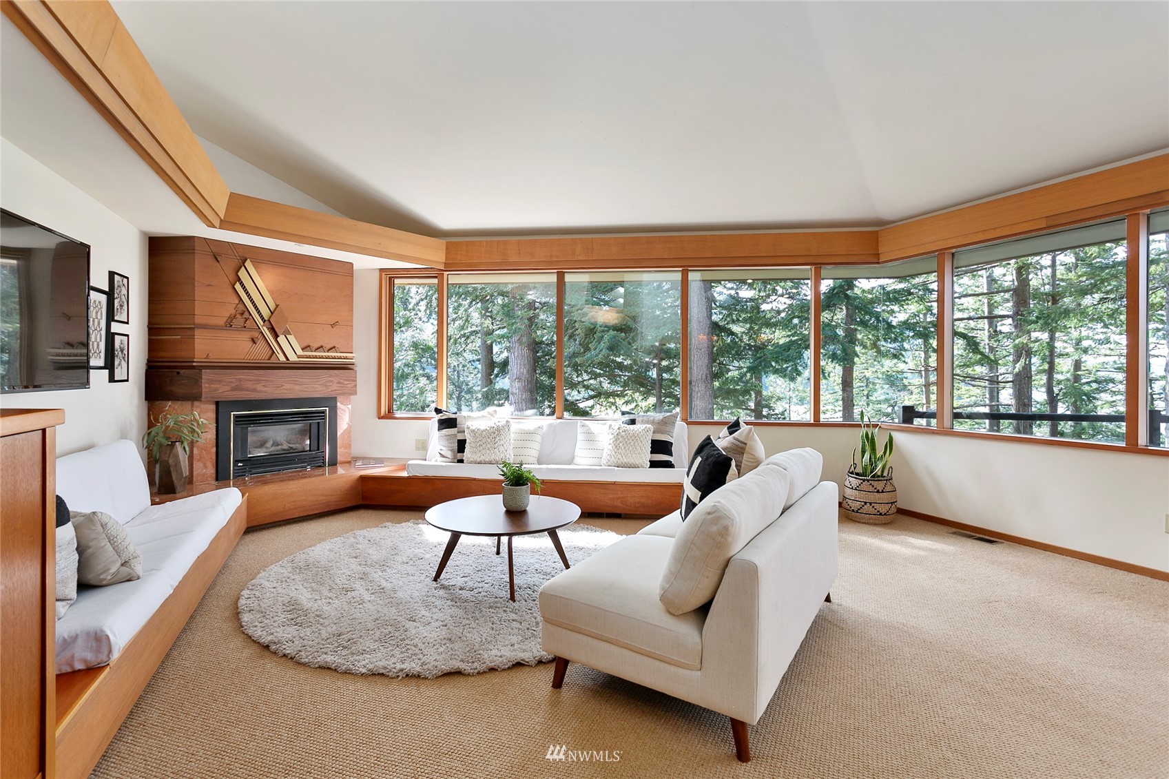 312 Sea Pines Road Bellingham, WA 98229 - Photo 6 of 39 a living room with furniture and a fireplace