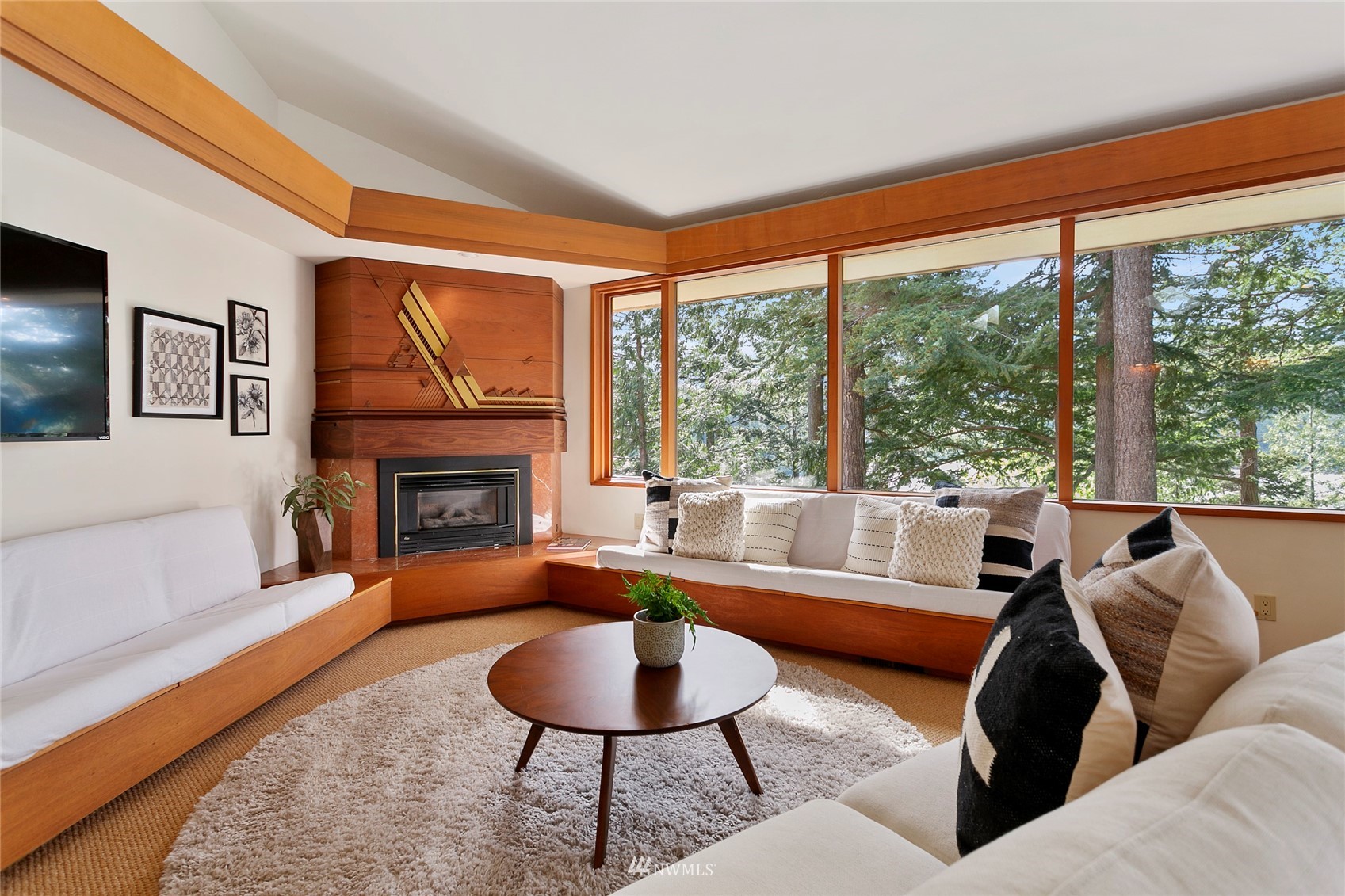 312 Sea Pines Road Bellingham, WA 98229 - Photo 7 of 39 a living room with furniture and a fireplace