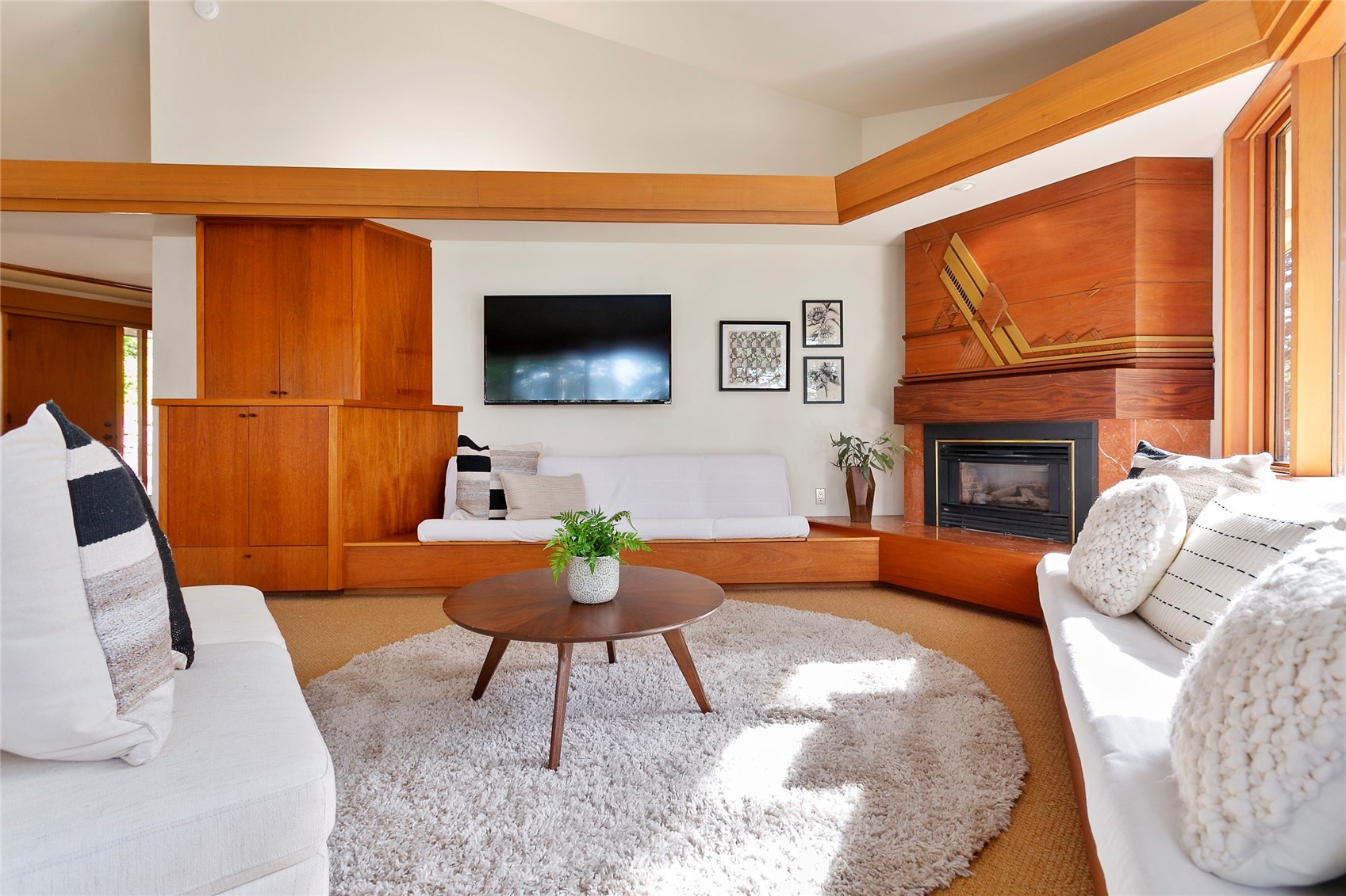 312 Sea Pines Road Bellingham, WA 98229 - Photo 9 of 39 a living room with furniture a flat screen tv and a fireplace