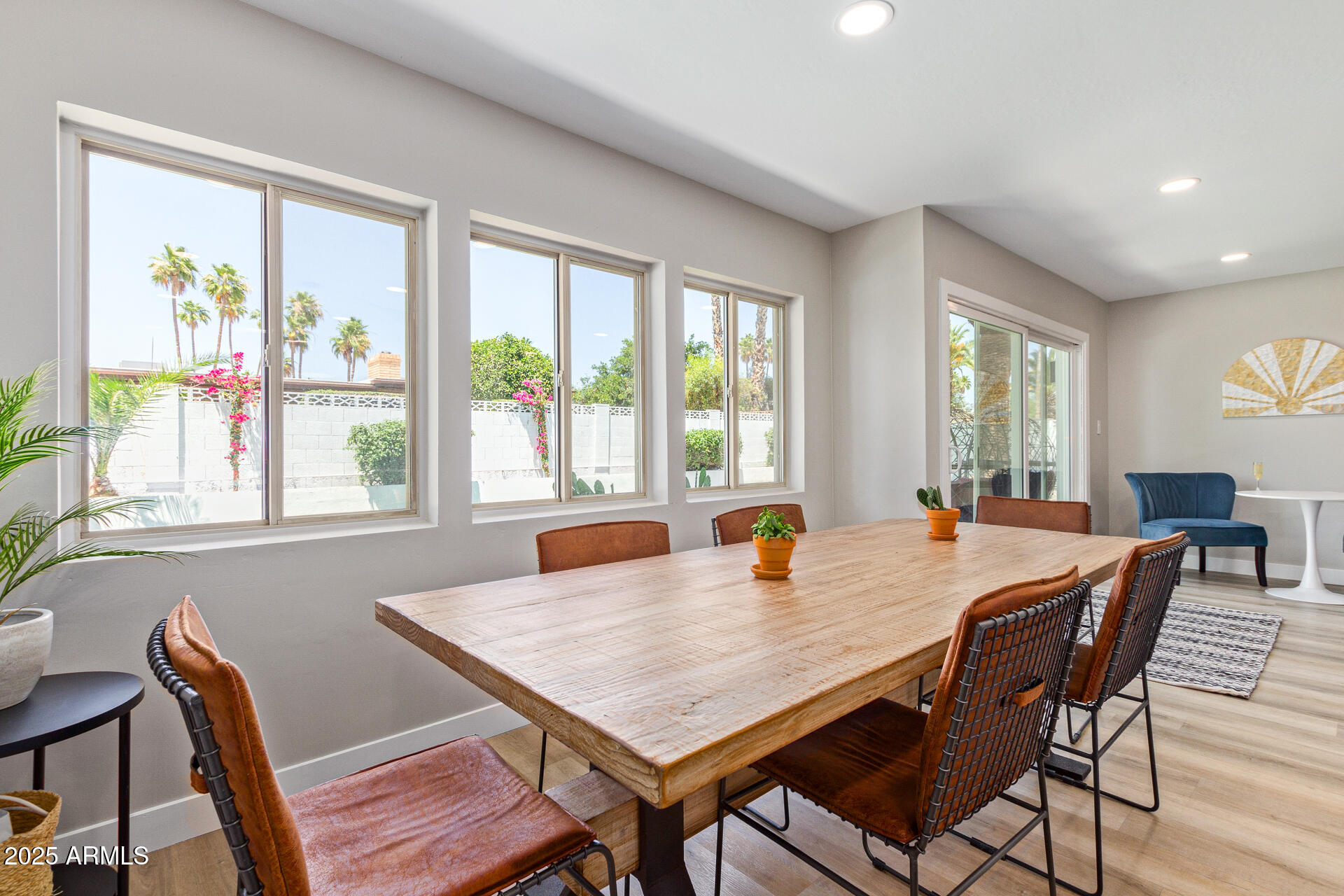6612 East Presidio Road Scottsdale, AZ 85254 - Photo 13 of 54 a view of a dining room with furniture and windows