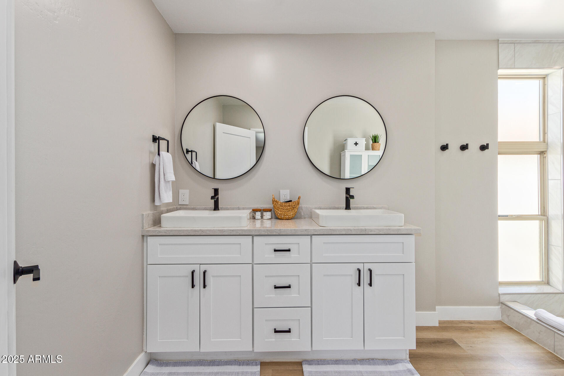 6612 East Presidio Road Scottsdale, AZ 85254 - Photo 23 of 54 a bathroom with a toilet a sink and a window