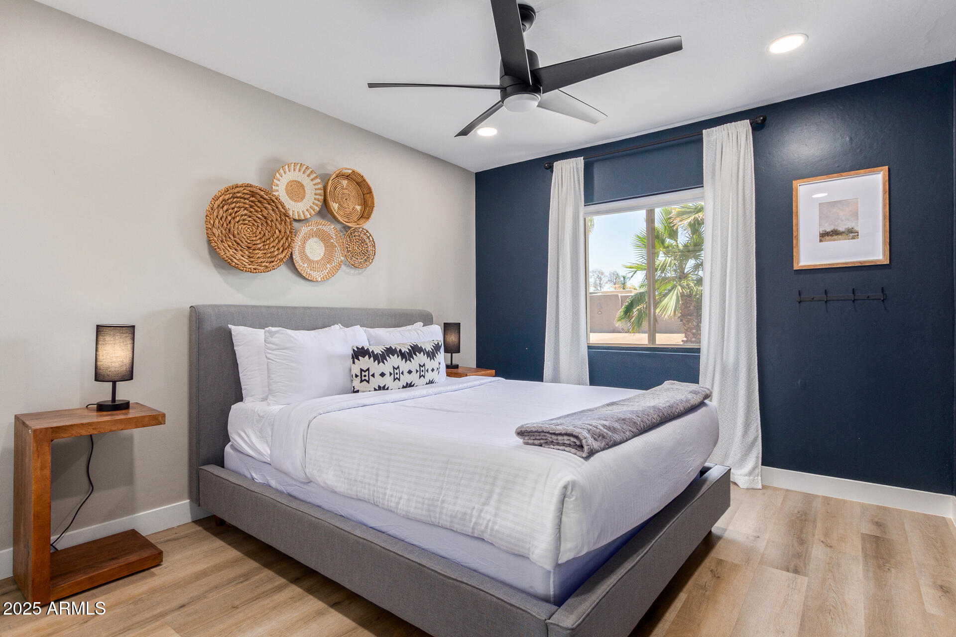 6612 East Presidio Road Scottsdale, AZ 85254 - Photo 26 of 54 a bedroom with a bed and a window