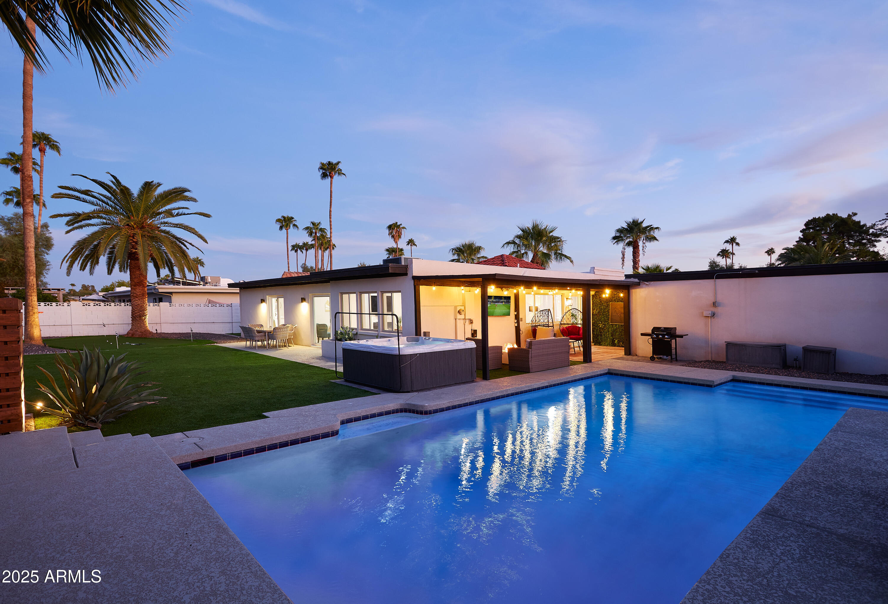 6612 East Presidio Road Scottsdale, AZ 85254 - Photo 38 of 54 a view of swimming pool with seating space