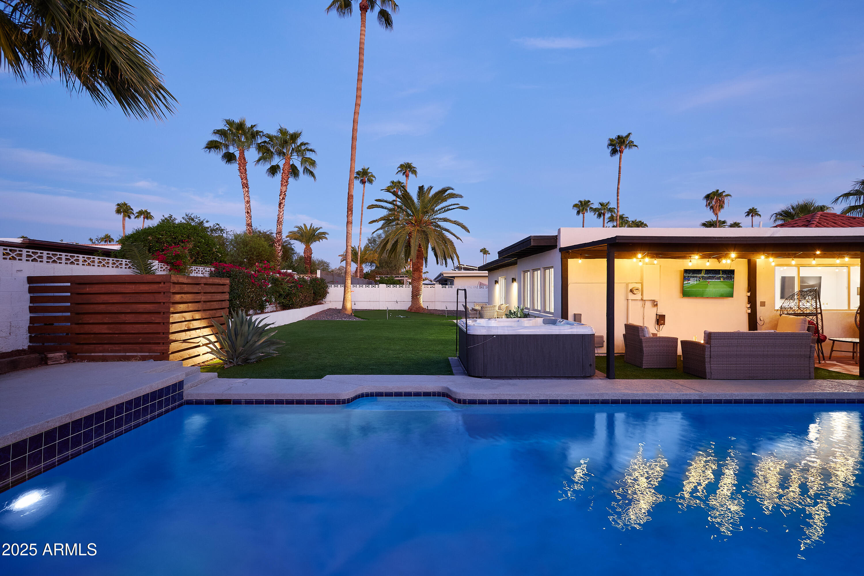 6612 East Presidio Road Scottsdale, AZ 85254 - Photo 41 of 54 a front view of a house with garden