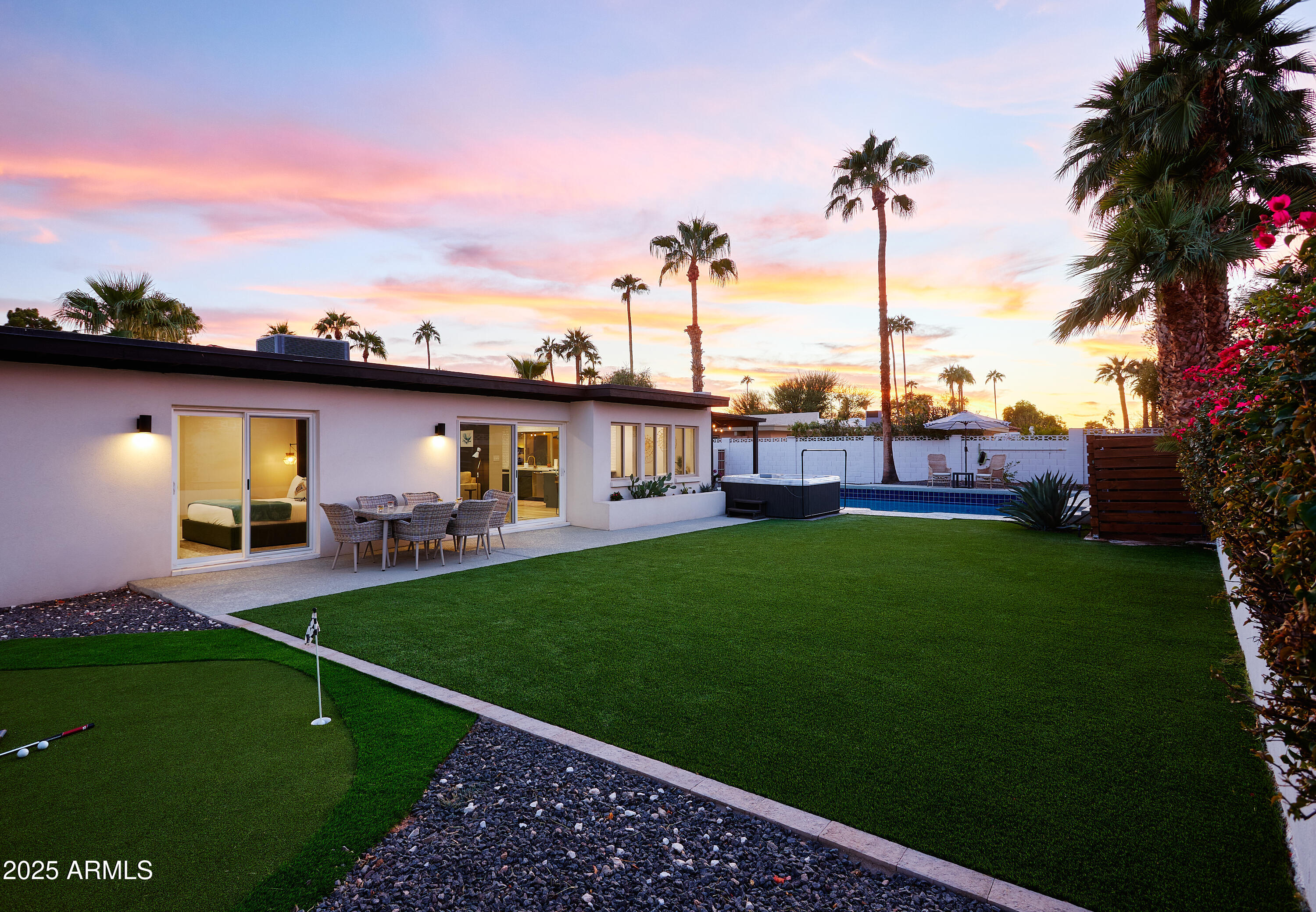 6612 East Presidio Road Scottsdale, AZ 85254 - Photo 50 of 54 a view of a backyard with a garden and plants