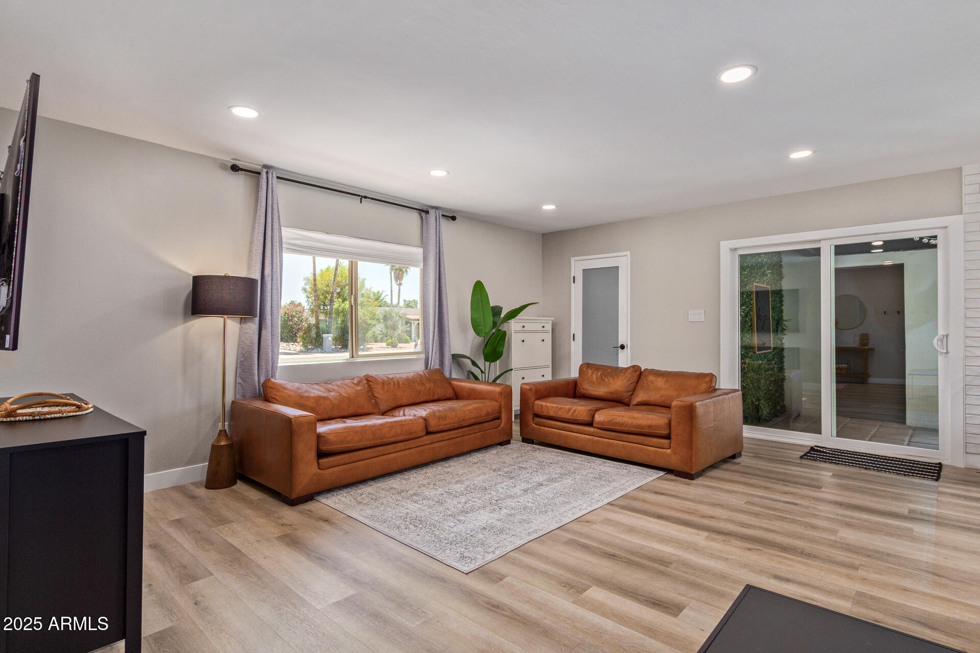 6612 East Presidio Road Scottsdale, AZ 85254 - Photo 9 of 54 a living room with furniture and a window