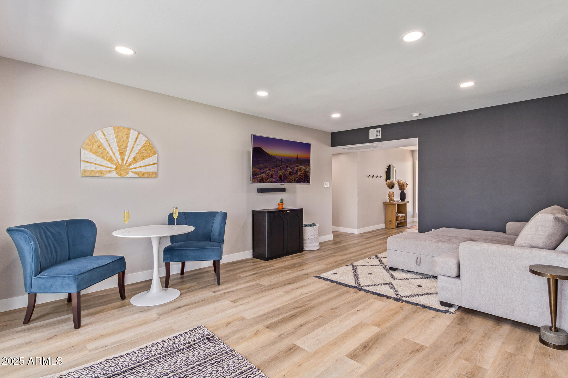 6612 East Presidio Road Scottsdale, AZ 85254 - Photo 10 of 54 a living room with furniture and a flat screen tv