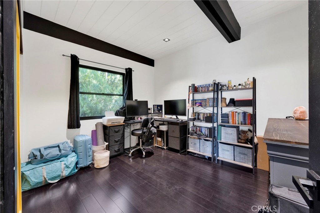 4009 Weslin Avenue Sherman Oaks, CA 91423 - Photo 11 of 44 a view of a livingroom with workspace and a window