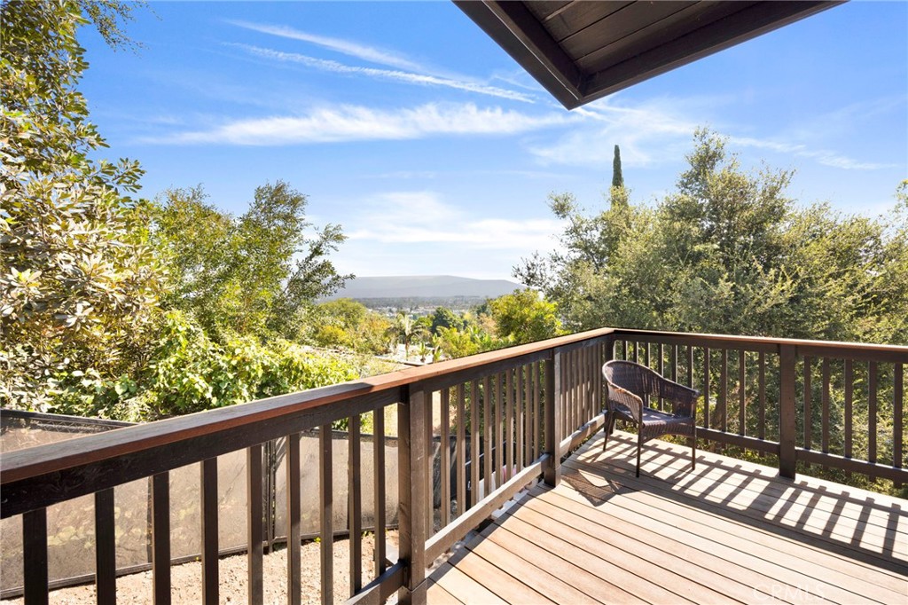 4009 Weslin Avenue Sherman Oaks, CA 91423 - Photo 17 of 44 a view of balcony with wooden floor and fence