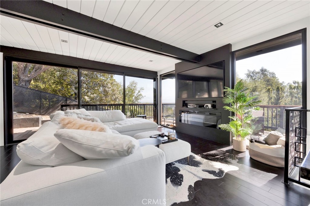 4009 Weslin Avenue Sherman Oaks, CA 91423 - Photo 2 of 44 a living room with furniture and a large window