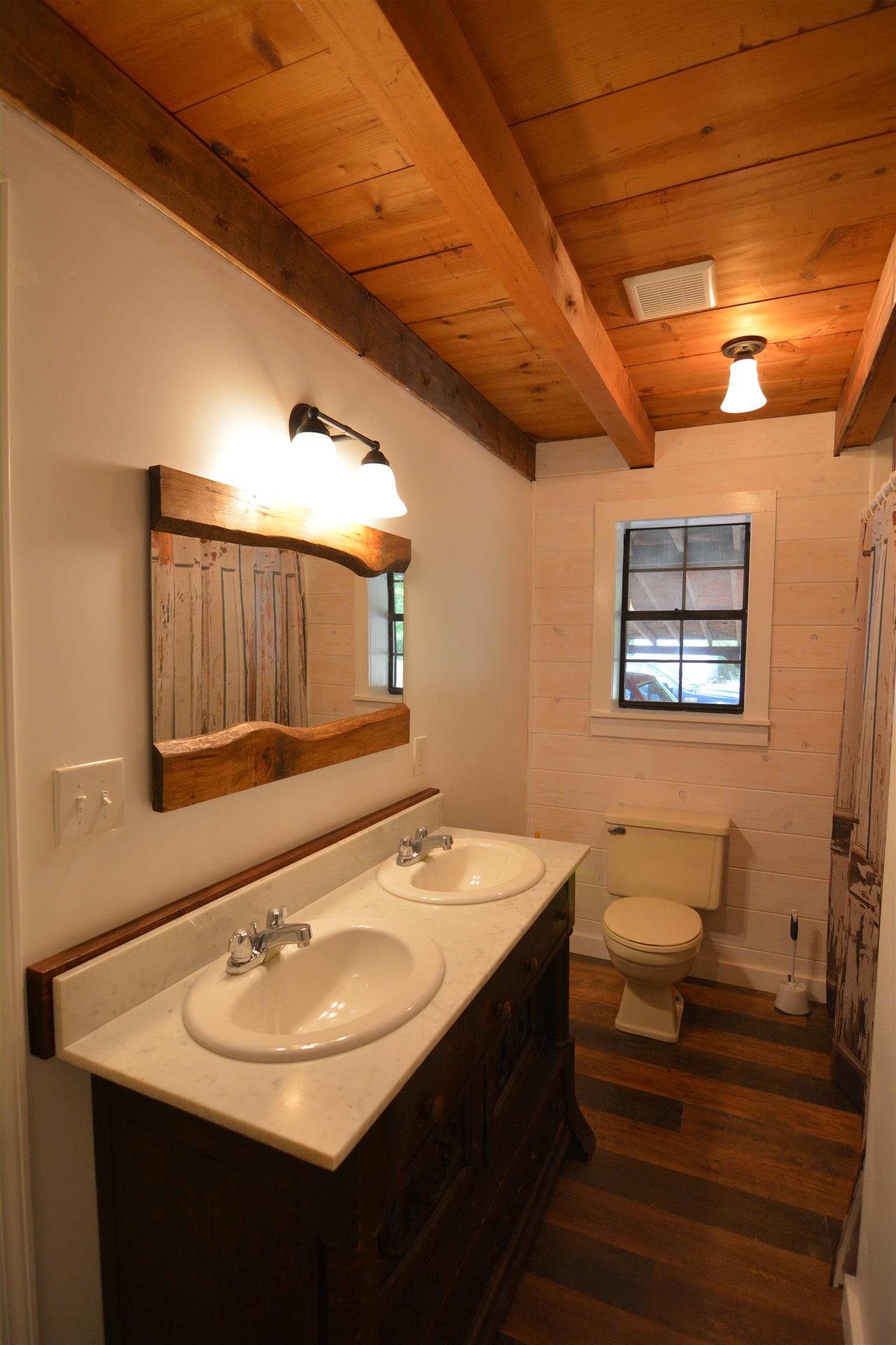 3261 Ridgeville Road Tullahoma, TN 37388 - Photo 15 of 21 The master bathroom has a double sink and custom built mirror!