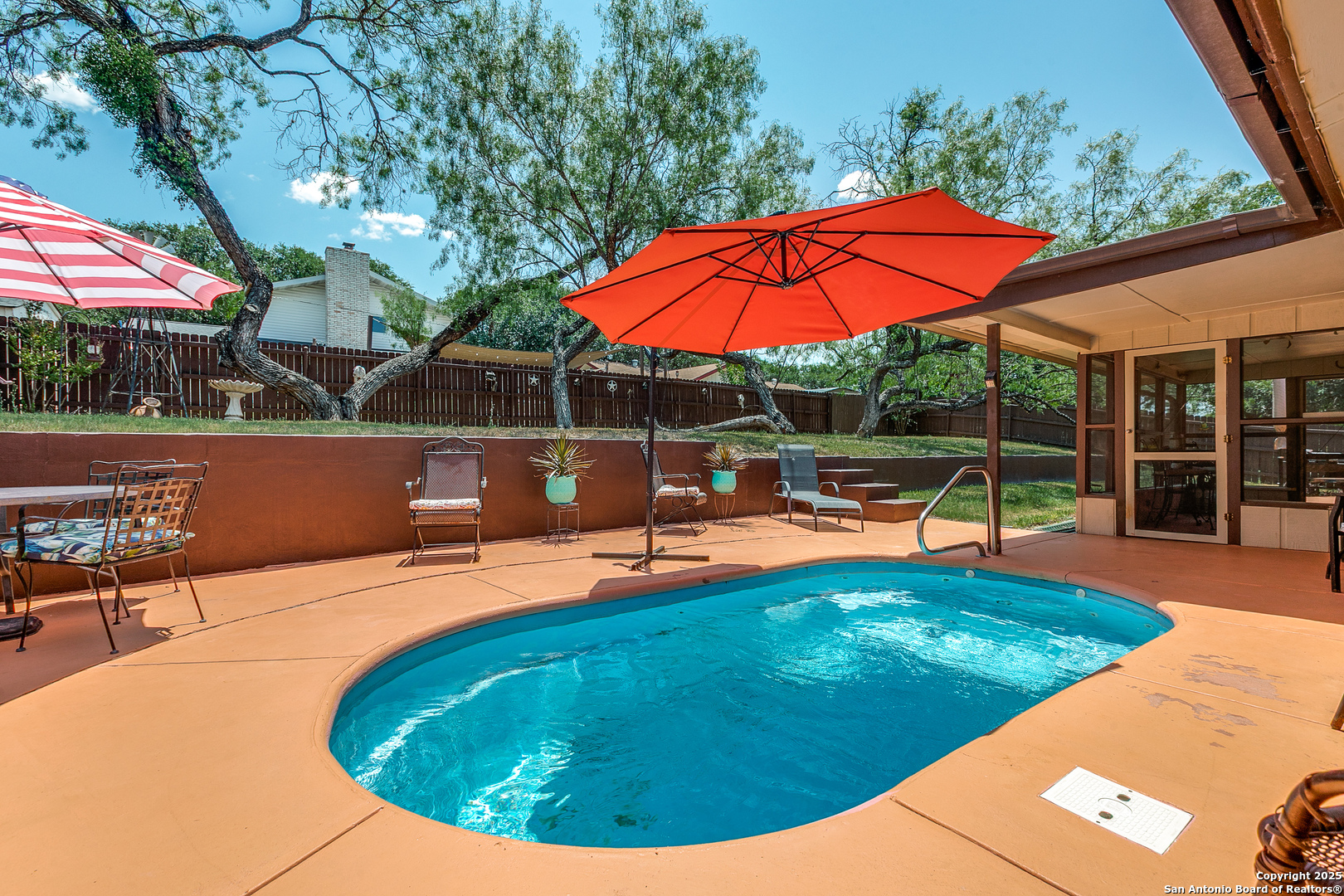 5915 Seneca Drive Leon Valley, TX 78238 - Photo 1 of 1 an outdoor space with swimming pool and furniture
