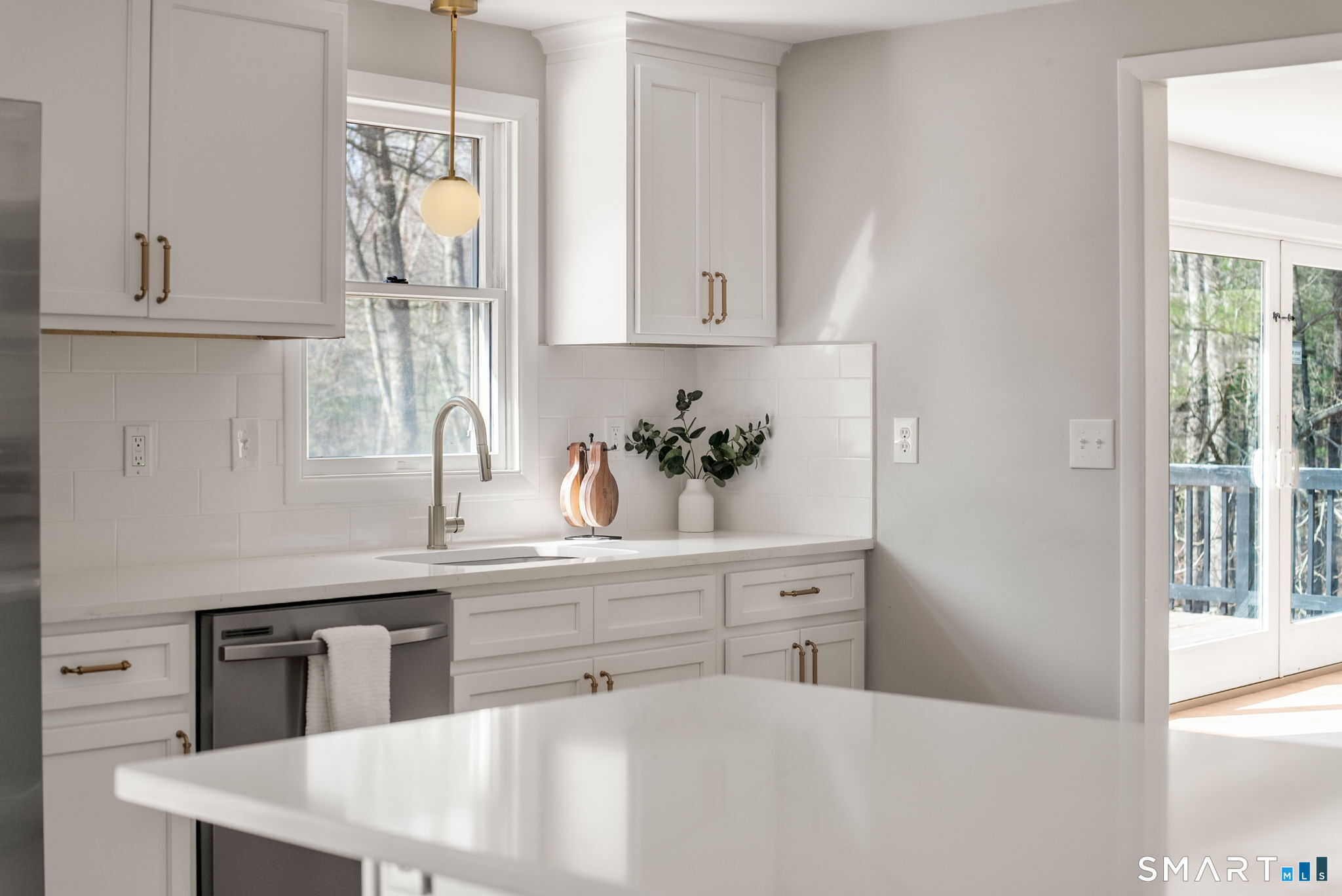 89 Bradway Road Stafford, CT 06076 - Photo 14 of 39 a spacious bathroom with a sink a mirror and a window