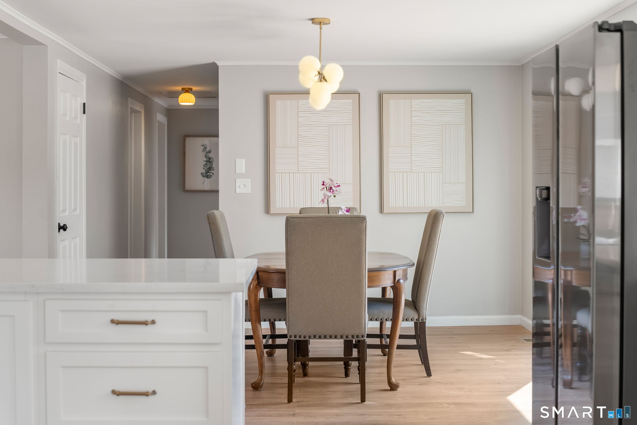 89 Bradway Road Stafford, CT 06076 - Photo 15 of 39 a view of a dining room with furniture and wooden floor