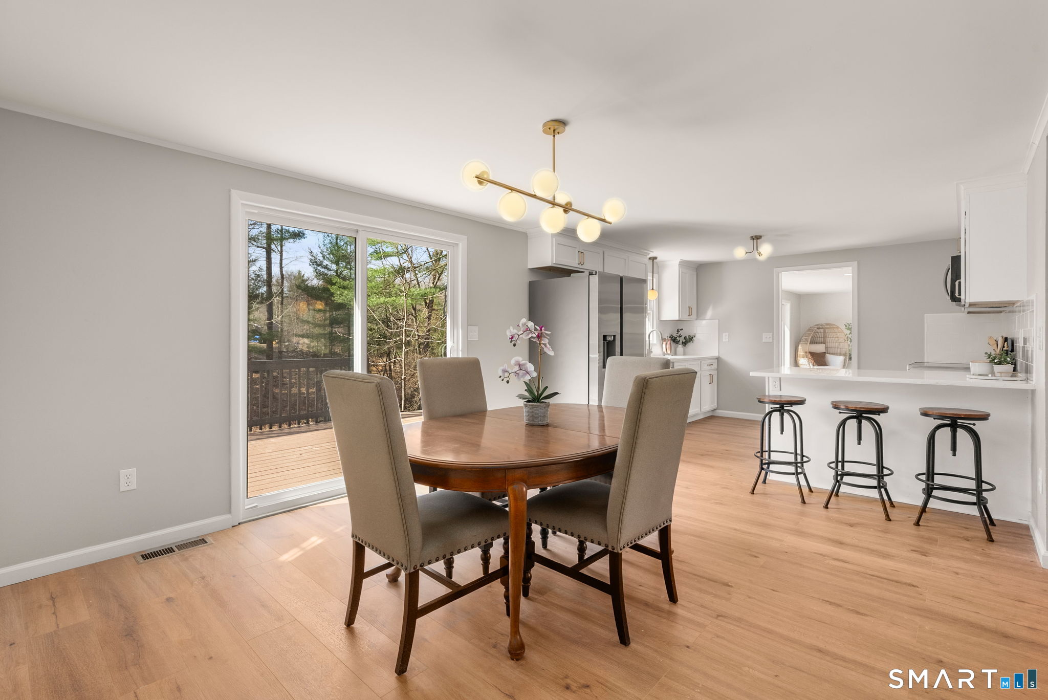 89 Bradway Road Stafford, CT 06076 - Photo 18 of 39 a dining room with furniture window and wooden floor