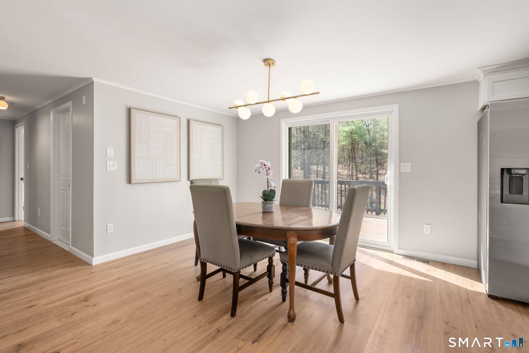 89 Bradway Road Stafford, CT 06076 - Photo 19 of 39 a dining room with furniture window wooden floor