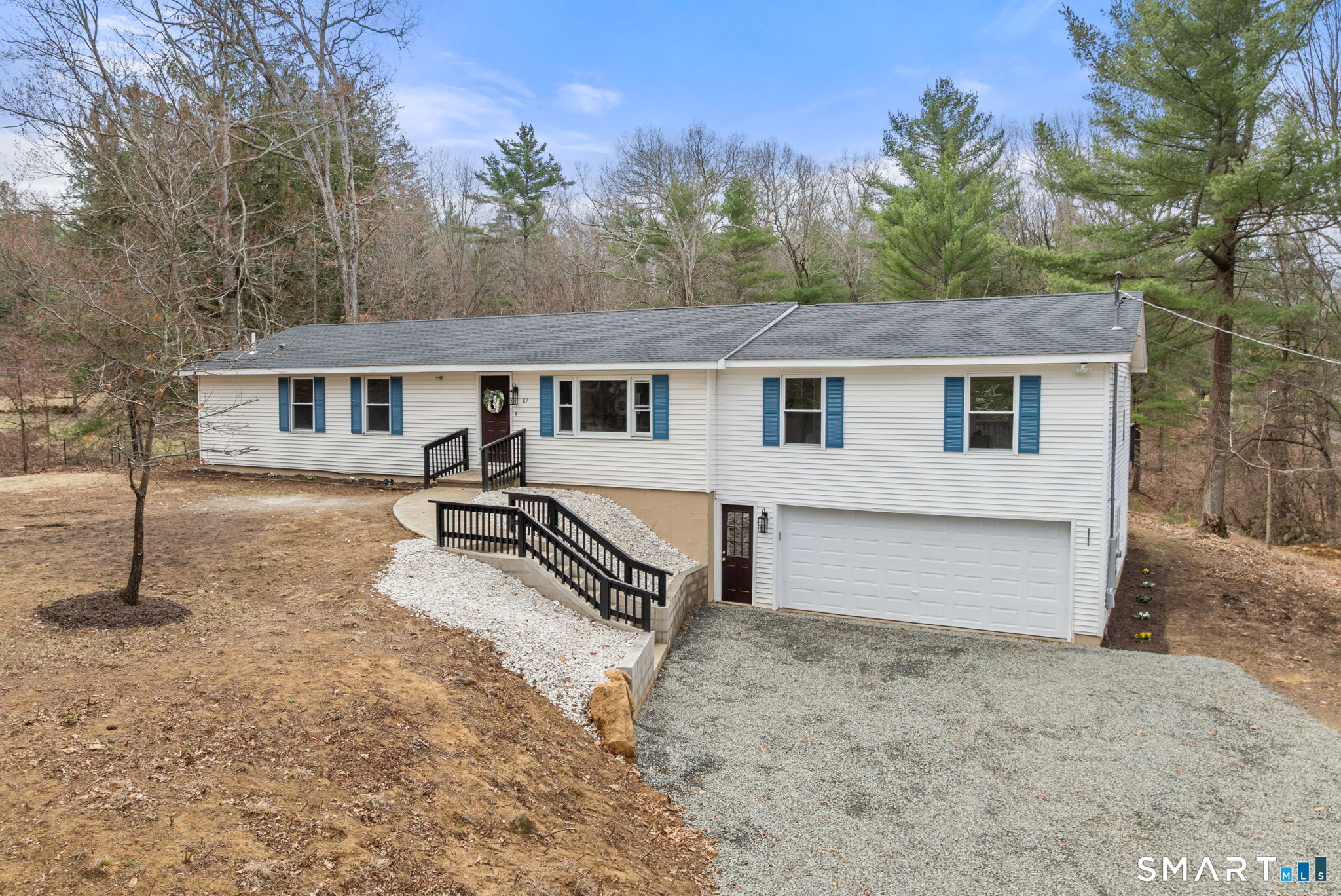 89 Bradway Road Stafford, CT 06076 - Photo 2 of 39 front view of a house with a yard