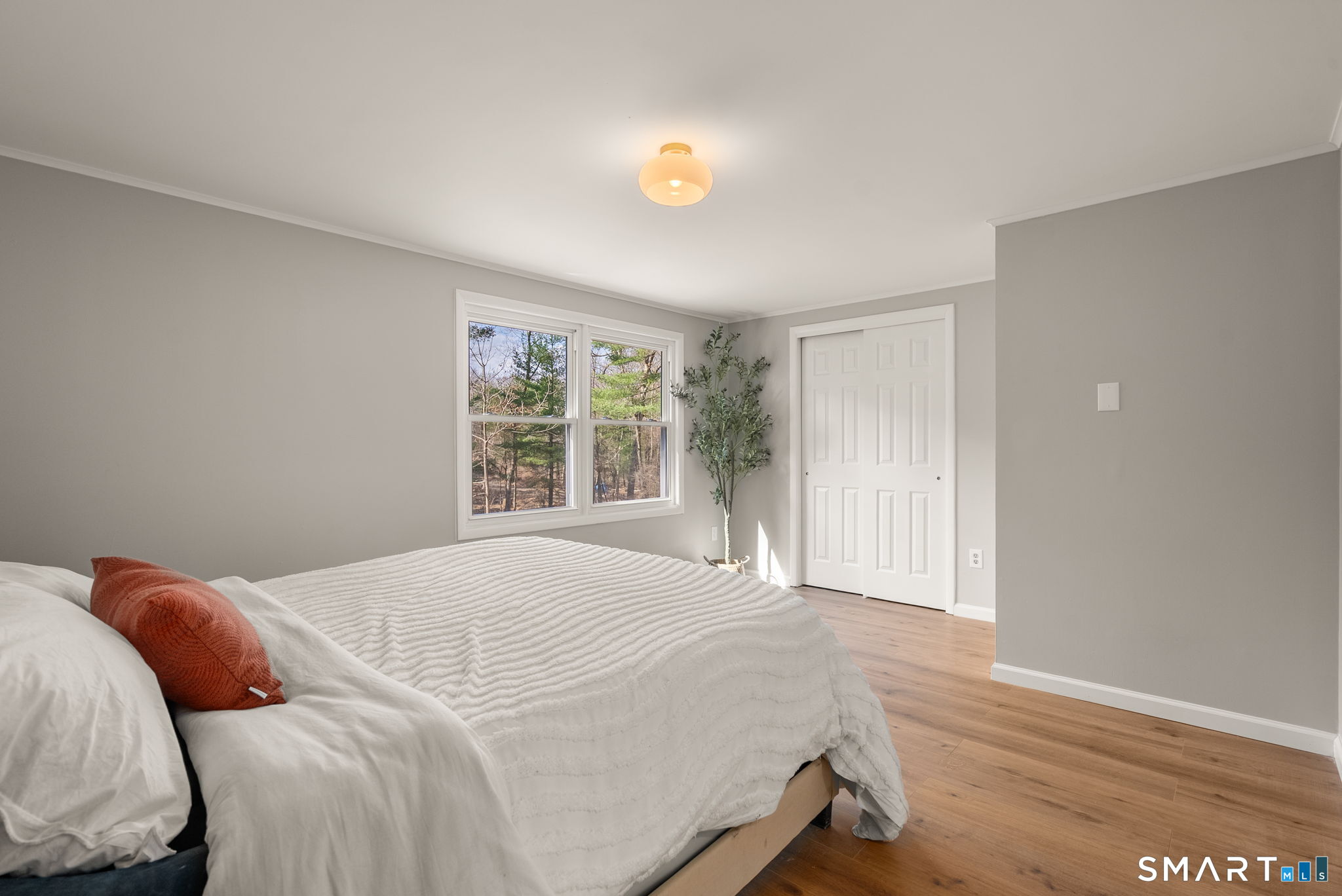 89 Bradway Road Stafford, CT 06076 - Photo 26 of 39 a bedroom with a bed and a window