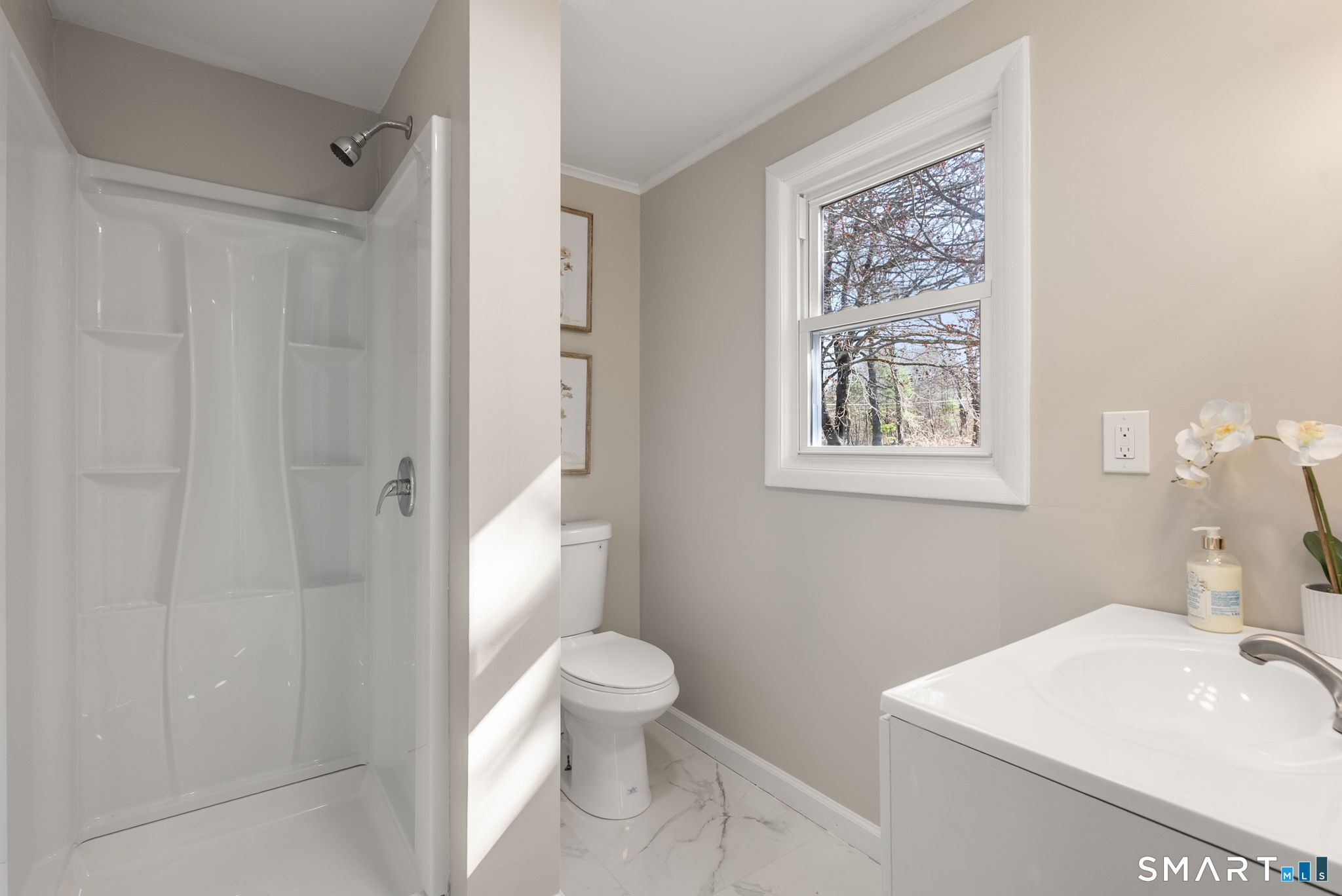 89 Bradway Road Stafford, CT 06076 - Photo 28 of 39 a bathroom with a sink toilet and shower