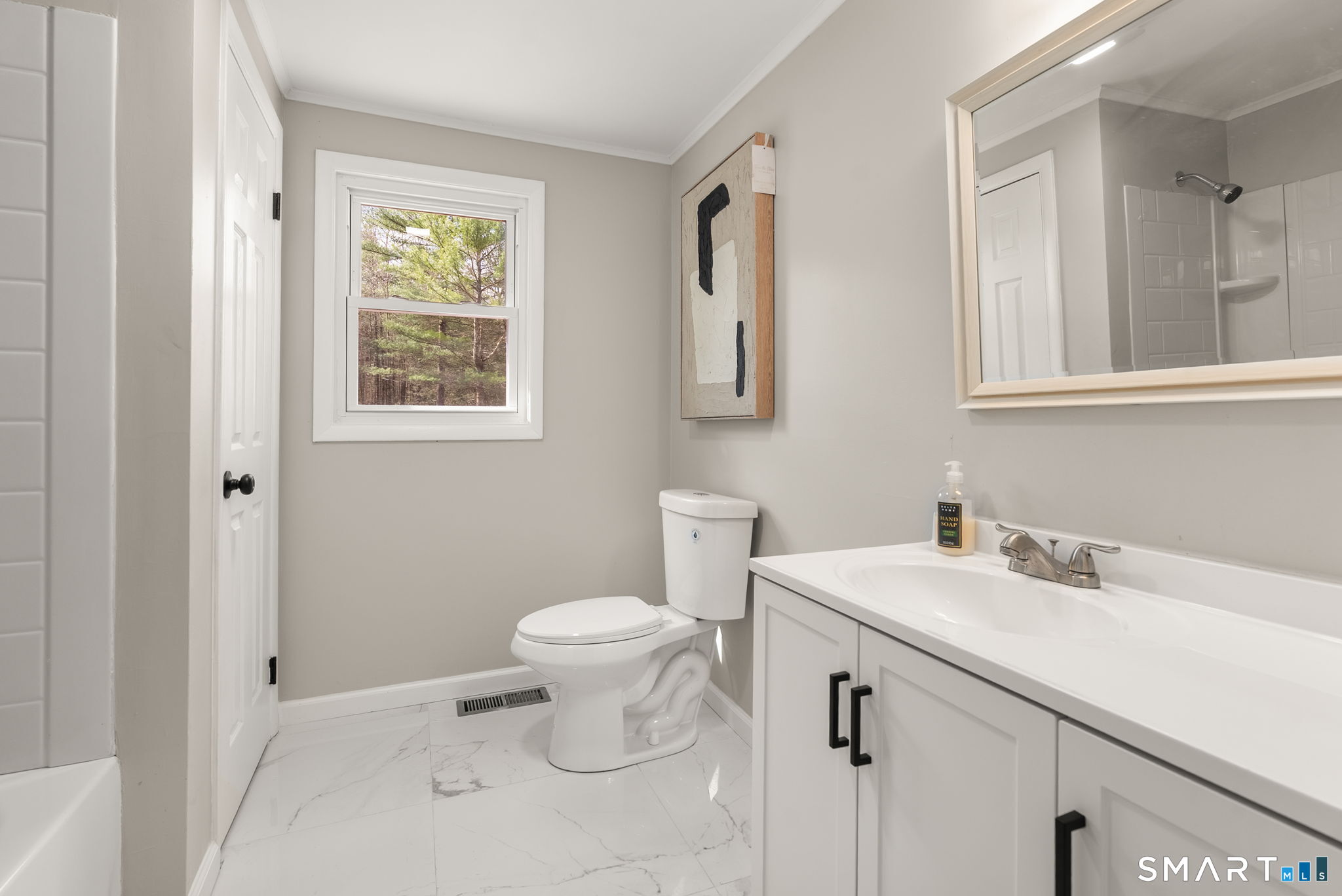 89 Bradway Road Stafford, CT 06076 - Photo 31 of 39 a bathroom with a sink and a toilet