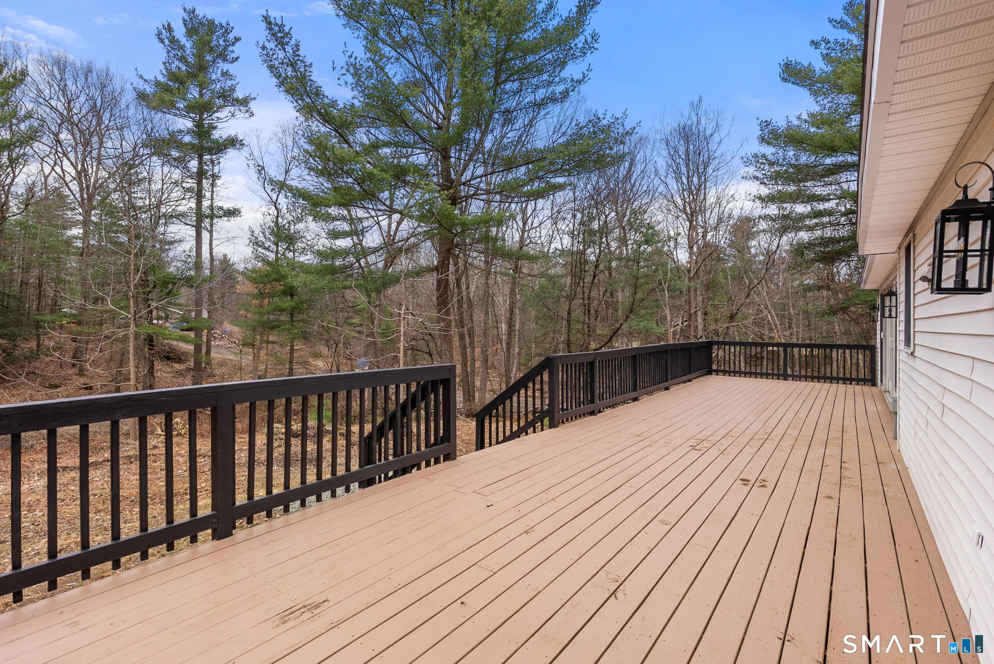 89 Bradway Road Stafford, CT 06076 - Photo 34 of 39 a view of balcony with wooden floor and fence