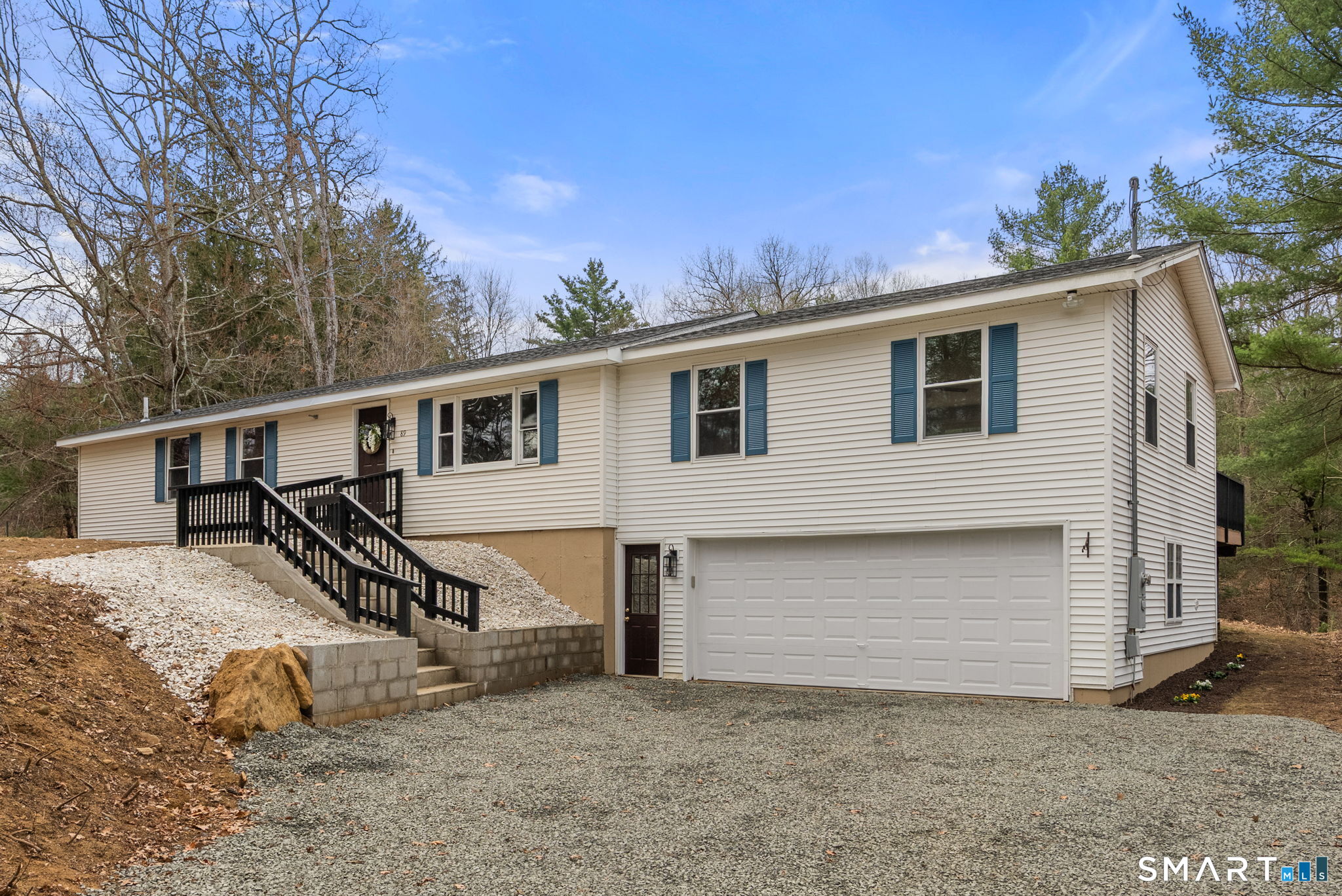 89 Bradway Road Stafford, CT 06076 - Photo 38 of 39 front view of a house with a yard