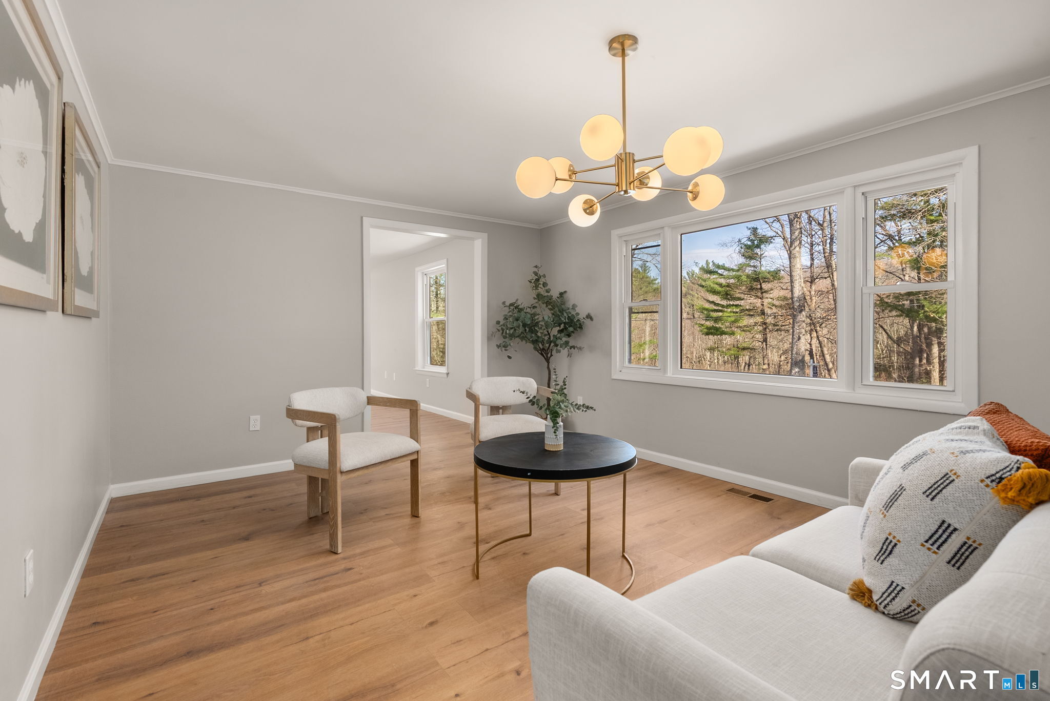 89 Bradway Road Stafford, CT 06076 - Photo 6 of 39 a living room with furniture and a large window