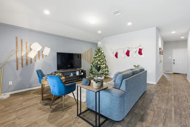 a bedroom with a bed and a desk