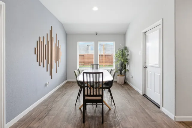 a bedroom with a bed and chair