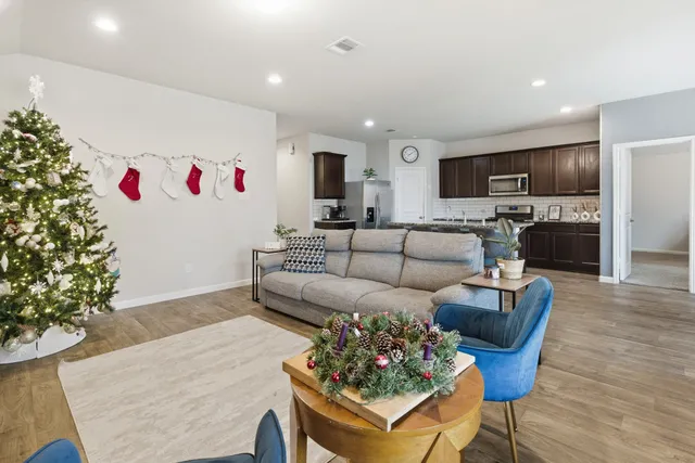 a kitchen with a table and chairs in it