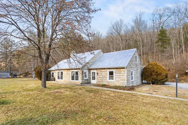 a house with trees in front of it