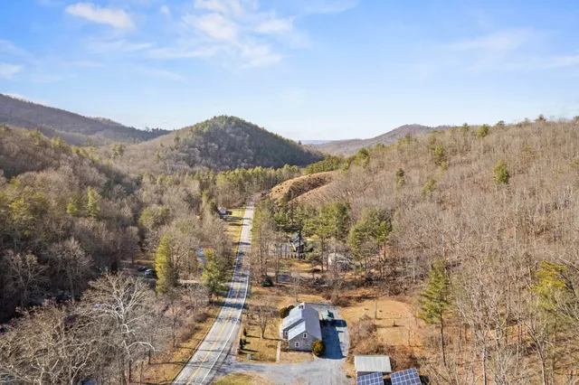 a view of a house with a mountain